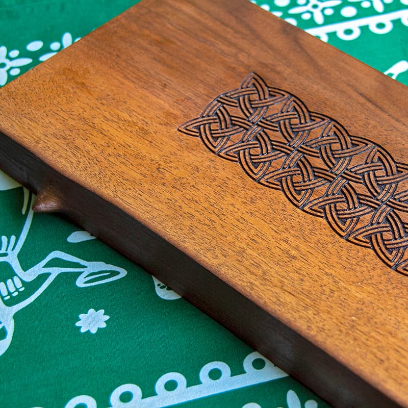 Walnut serving board with 11th century ornament 15*28 cm